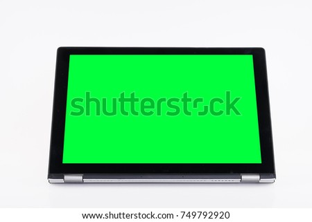 Laptop or notebook computer with a chroma key green screen or display on a isolated background