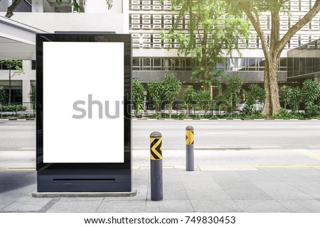 Blank white mock up of vertical light box billboard at bus stop station
