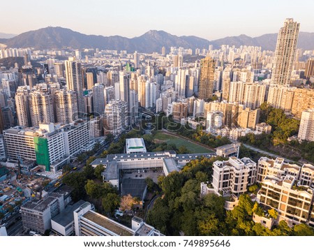 Top view of Hong Kong city under sunset