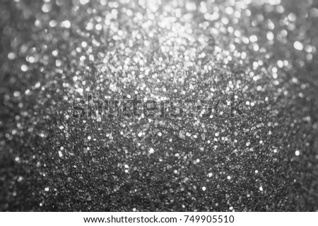 Black glitter sparkle background. Black friday shiny pattern with sequins. Christmas glamour luxury pattern, black christmas and glitter diamond background. Dark silver pattern.