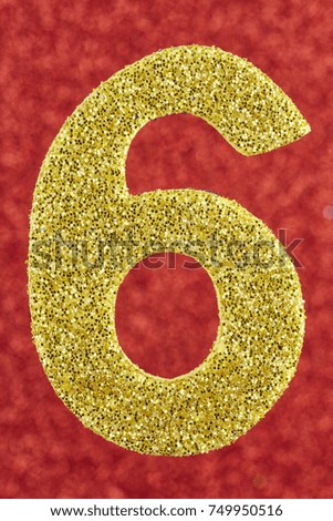 Number six gold color over a red background. Anniversary. Vertical