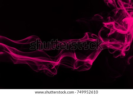 Pink smoke abstract on black background, darkness concept Royalty-Free Stock Photo #749952610