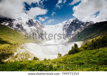 Grand cliffs near Mt Tetnuldi. Location Upper Svaneti, Georgia country, Europe. Main Caucasian ridge. Scenic image of lifestyle hiking concept. Excellent wallpapers. Explore the beauty of earth.