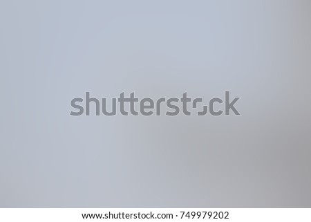 Abstract blurred gray, white and blue background out of focus for design
