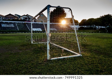          Sunset field and a soccer goal