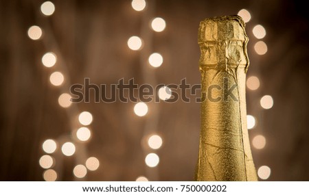 Champagne Glasses Infront Of Defocused Lights as Christmas or New Year party background
