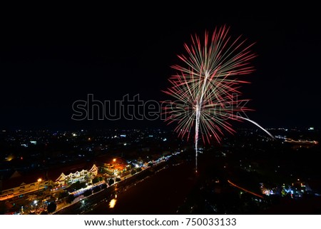 Colorful firework in a night sky at chiangmai,Thailand