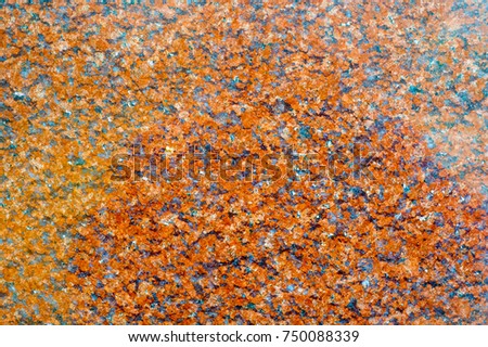 background texture, tulle blue. Granite stone is polished. It is a rich red granular granite