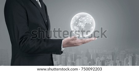 Business man holding world map network connection and icon of media screen concept