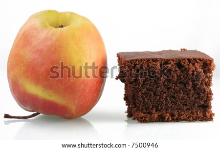 close up picture of an  apple and cake