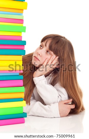 bored, female student sitting by the desk with pile of books in front of her