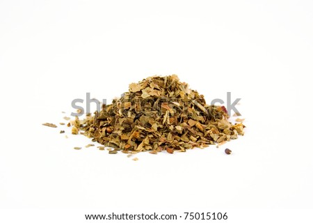 the herb Basil in a pile isolated on white