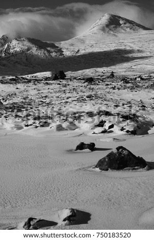Rannoch Moor and the Black Mount, Highland Scotland, in heavy snow, monochrome image