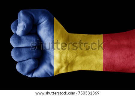 Fist painted in colors of Romania flag, fist flag, country of Romania
