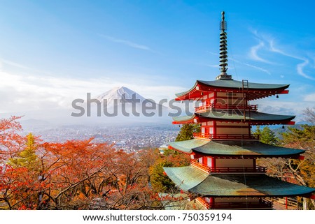 Mt. Fuji viewed from behind red Chureito Pagoda in autumn fall colors, Fujiyoshida, Japan Royalty-Free Stock Photo #750359194