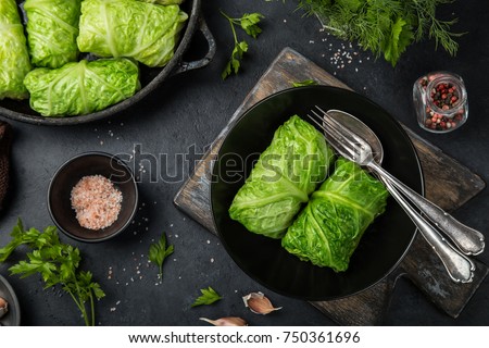 savoy cabbage rolls stuffed with meat and vegetables, top view Royalty-Free Stock Photo #750361696