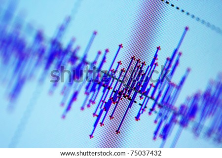 Audio, seismic or stock market wave diagram. Macro closeup, shallow DOF. Royalty-Free Stock Photo #75037432