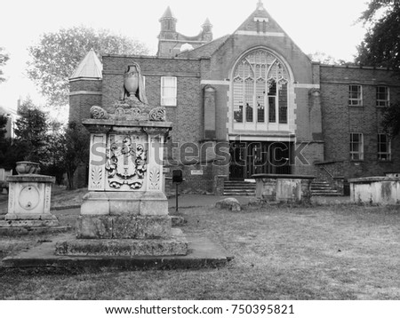 An old ornamental tombstone adorns an English churchyard in York.