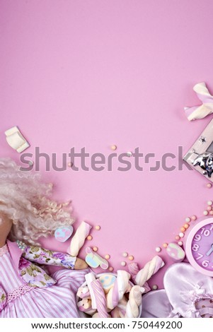 handmade textile doll, marshmallow Icons and satin slippers for a girl on a pink background. 