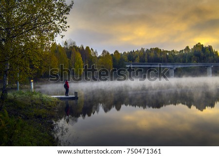 Beautiful foggy morning at Jevnaker Lake Oslo Norway Royalty-Free Stock Photo #750471361