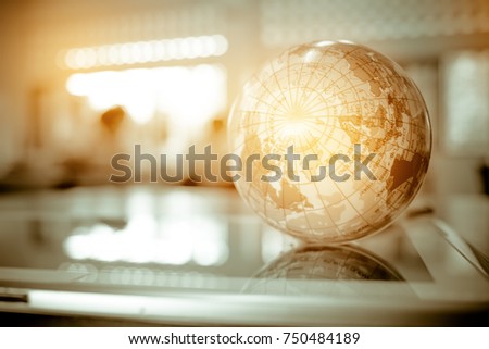 Earth globe model ball map with Radar background on tablet in classroom. Concept for global international education or communications, politics environmental for learning world wide. vintage tone