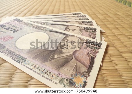 Japanese 10,000 (ten-thousand) yen note on tatami matting