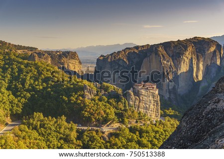 Panoramic photo of the monasteries and rock formations of Meteora above Kalampaka city in Thessaly, Greece, Europe.