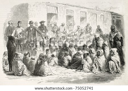 Food distribution by French settlers to Arab population in Setif, Algeria. Created by Janet-Lange and Dutheil after photo of Mercier, published on L'Illustration, Journal Universel, Paris, 1868 Royalty-Free Stock Photo #75052741