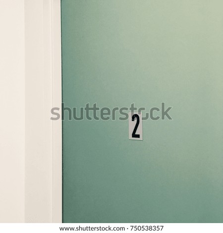 Number on the green door