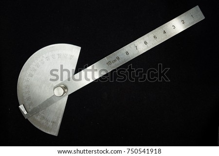 Protractor angle finder stainless steel isolated with black background