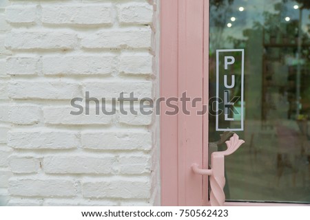 wording "pull" sticker put on clear glasses door or window.letter wording sign sticker is symbol use for tell customer mostly put on front door of shop store and office.
