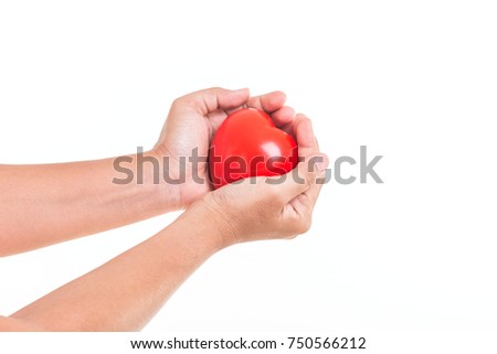 Love heart concept : Hand of woman holding red heart isolated on white background