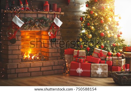 interior christmas. magic glowing tree, fireplace and gifts  