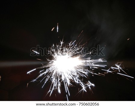Sparklers for Christmas and New Year celebrations. Welcome to 2018.Happy New Year. Abstract background of Black and White. 