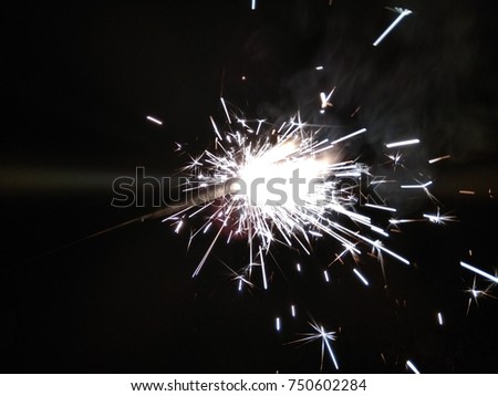 Sparklers for Christmas and New Year celebrations. Welcome to 2018.Happy New Year. Abstract background of Black and White. 