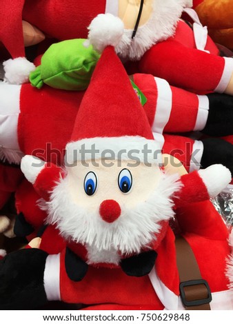 Cute stuffed toy Santa Claus sell in the store. Christmas present.