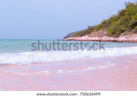 Soft wave with clear sand of sea on seashore.