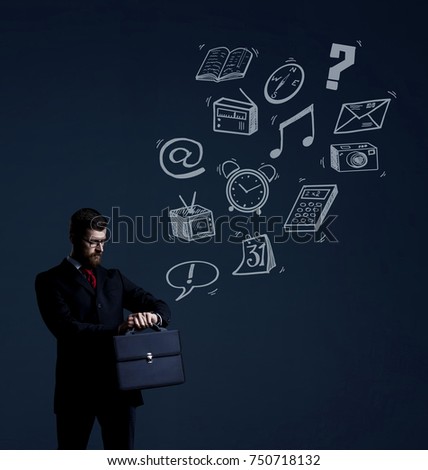 Businessman with briefcase checking time over dark dramatic background. Business and office, concept.