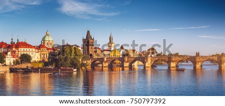 View of the Vltava River and the bridges shined with the sunset sun, Prague, the Czech Republic Royalty-Free Stock Photo #750797392