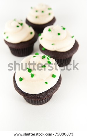 Chocolate Cupcakes with Green Icing and St. Patrick's Day Decorations