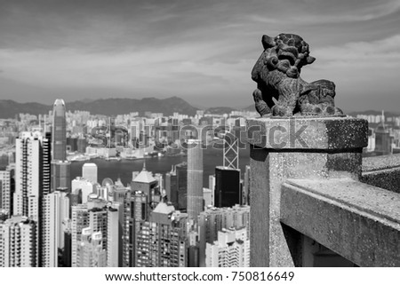 Chinese Lion statue at Victoria peak the famous viewpoint in Hong Kong (Black and white)