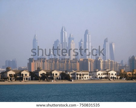 Dubai landscape - mixed architecture styles at water's edge, holiday destination