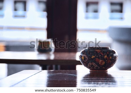Focused Vase on table with blurry background