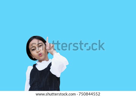 Asian girls in advertising stance on blue background