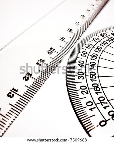 Close up of different rulers and school supplies