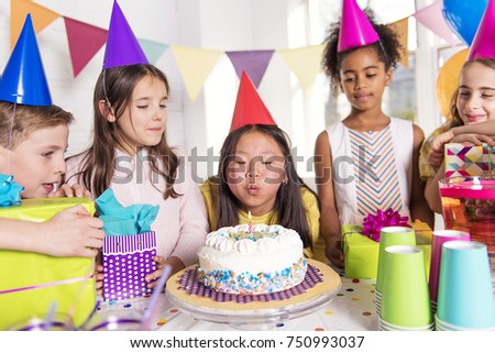 A group of children at birthday party at home