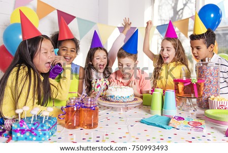 A group of children at birthday party at home