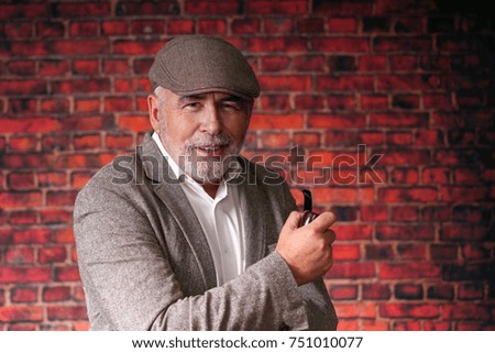 Portrait of a man with a pipe
