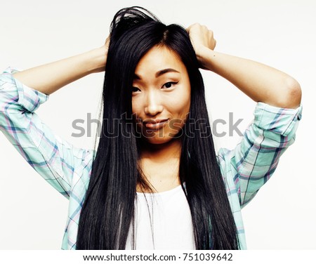 young pretty asian woman posing cheerful emotional isolated on white background, lifestyle people concept closeup