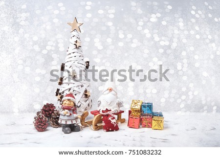 Christmas greeting card. Christmas tree, Noel gnomes, small gifts, snow texture. Christmas symbol.